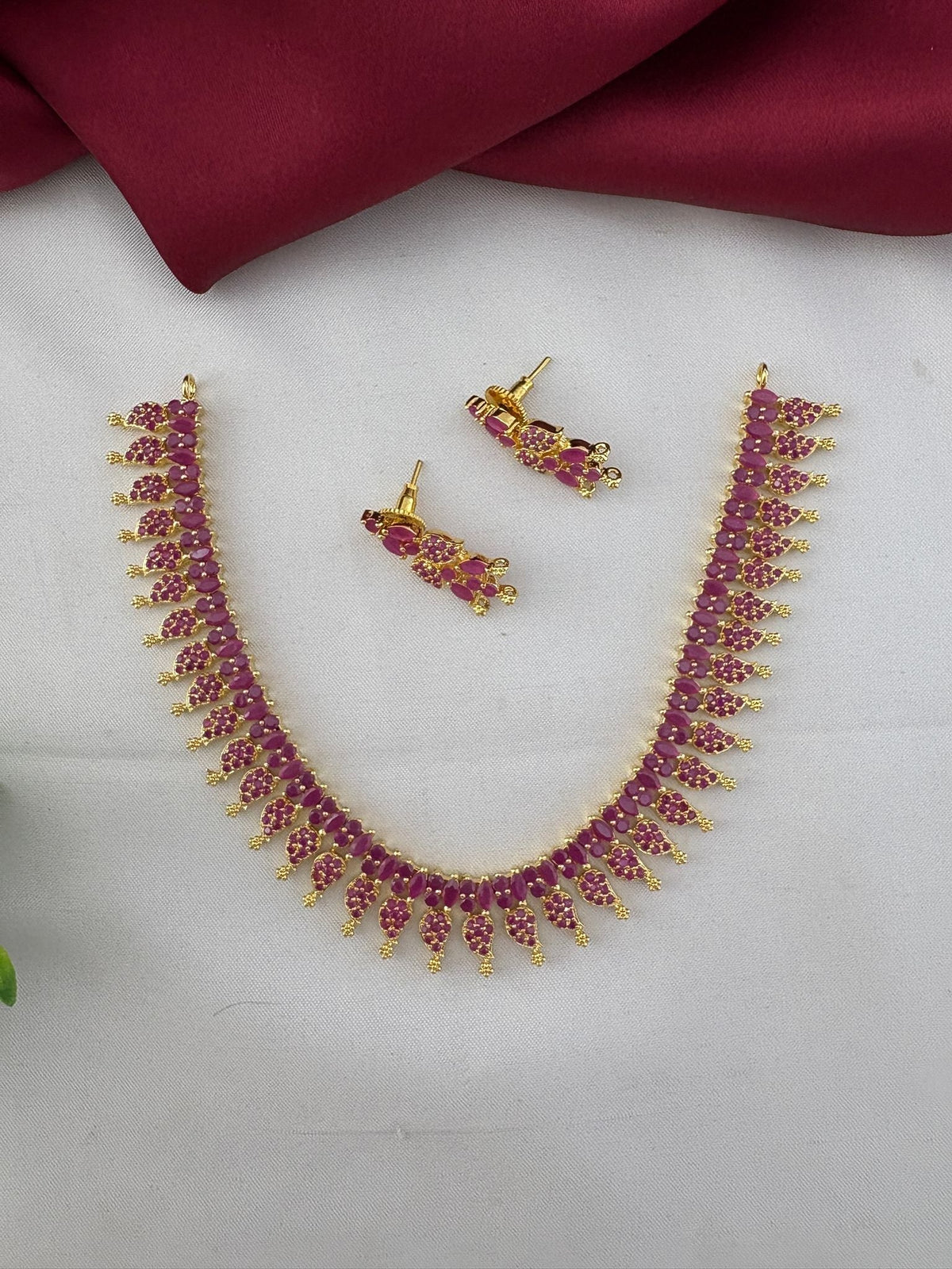 Bridal Wear Ruby-Tone CZ Short Necklace Set - South India Special - Angled view of the ruby necklace and matching – view 3