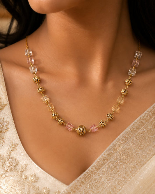 clear cube bead and pearl-look necklace worn at the collarbone – view 2