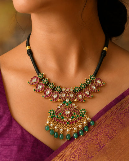 black-toned bead floral pendant jadau kundan necklace on jewellery display – view 2