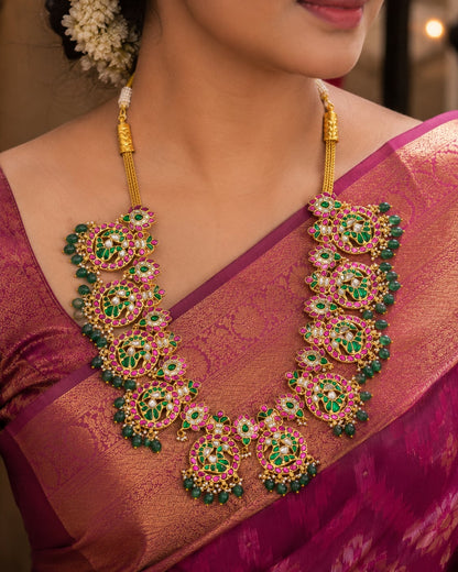 broad floral panel jadau kundan long haram necklace on jewellery display – view 2