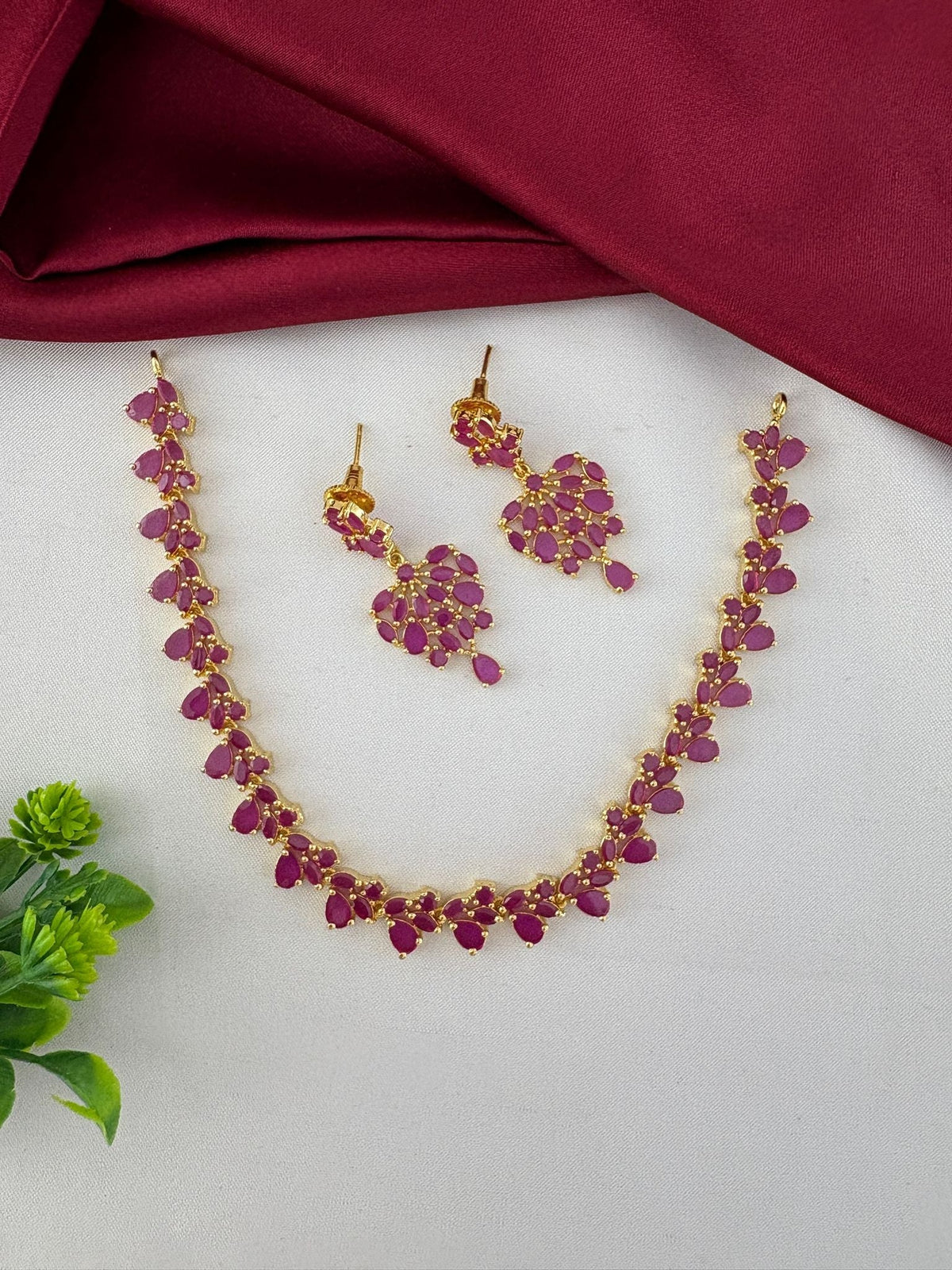 Classic Ruby CZ Short Necklace Set with Timeless Appeal – Styled view of the Classic Ruby-Tone CZ Short Necklace – front view