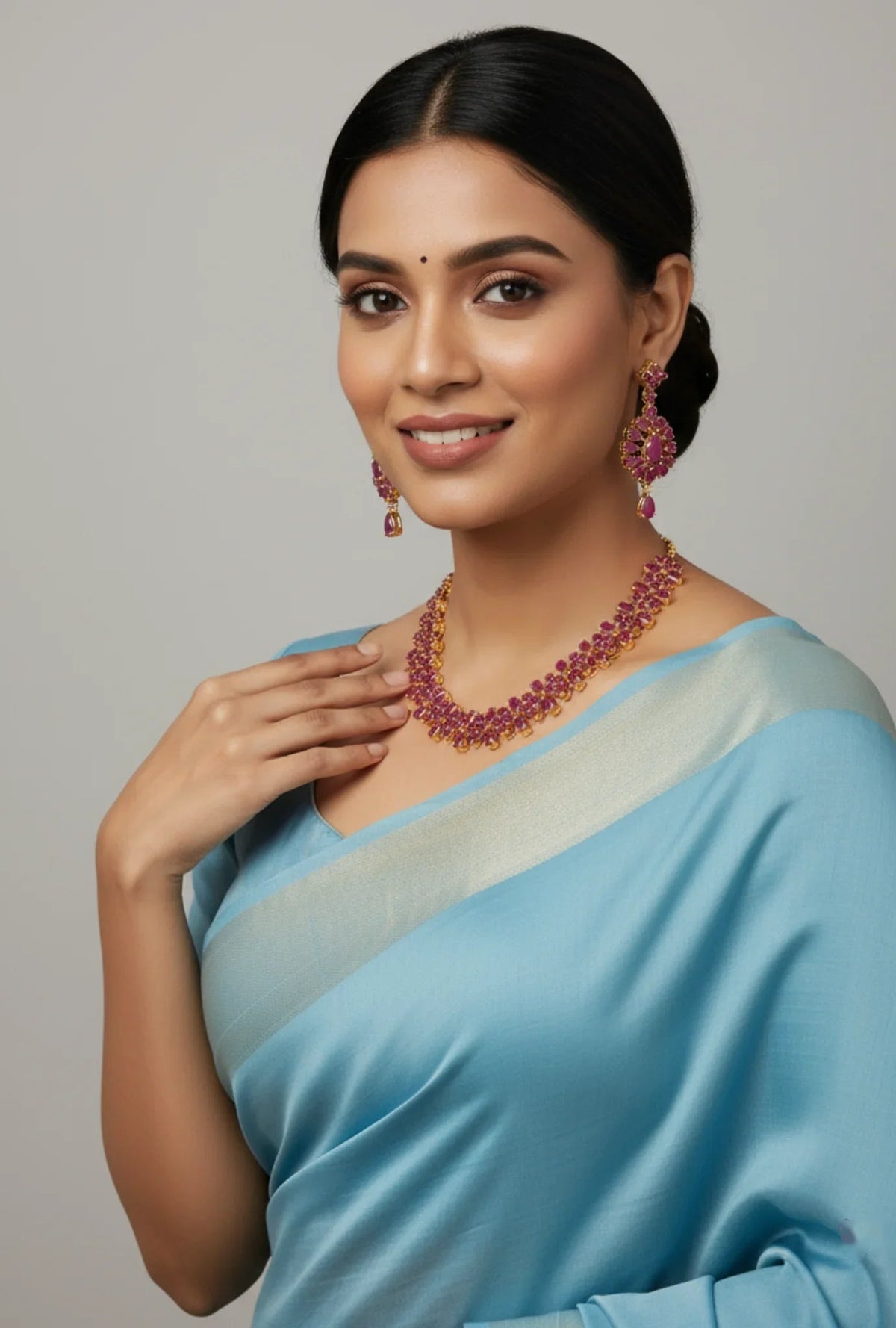 Crimson Ruby Necklace Set for Sarees – crimson ruby-tone necklace set styled with a light blue saree – view 2