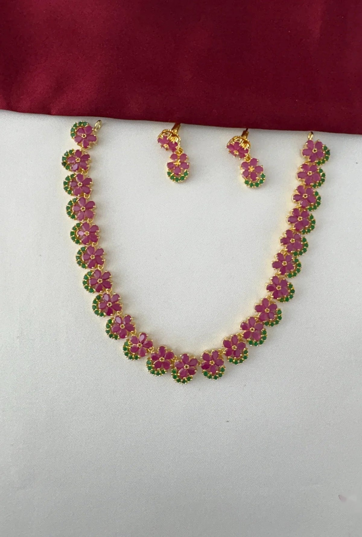 Delicate Cluster Necklace Set with Ruby and Emerald Accents – Gold Plated Floral Ruby Emerald Necklace Set – front view