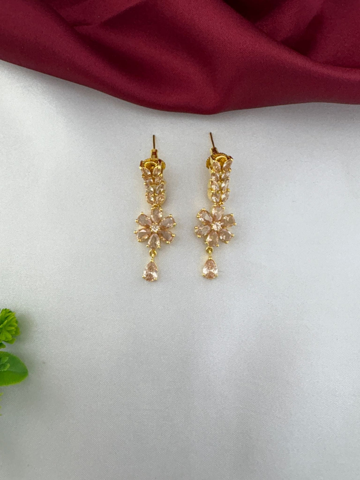 Close-up of Festive Sunbeam Gold AD Stone floral drop earrings – view 2