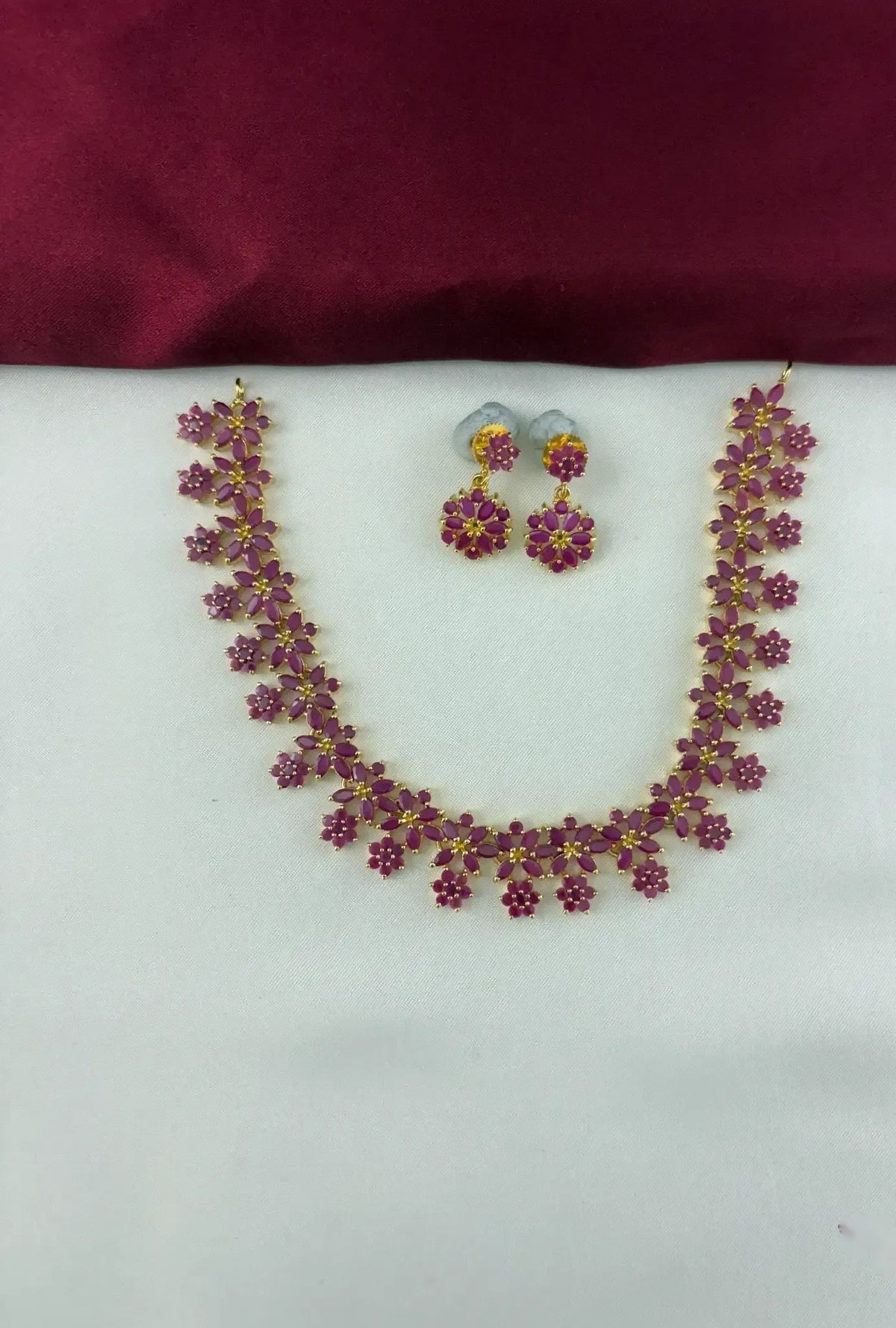 Gold-Plated Ruby Floral Necklace Earring Set - Delicate Bloom – Gold Plated Ruby Floral Necklace Earring Set – front view