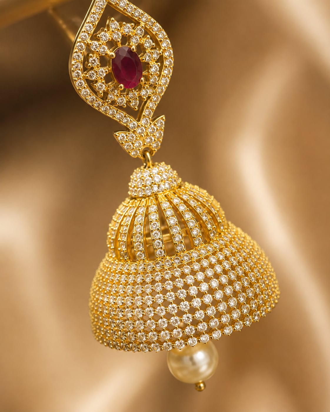 Ruby Paisley Gold-Plated CZ Bell Jhumka Earrings – Close-up of gold-plated ruby paisley CZ bell jhumka earrings – view 4