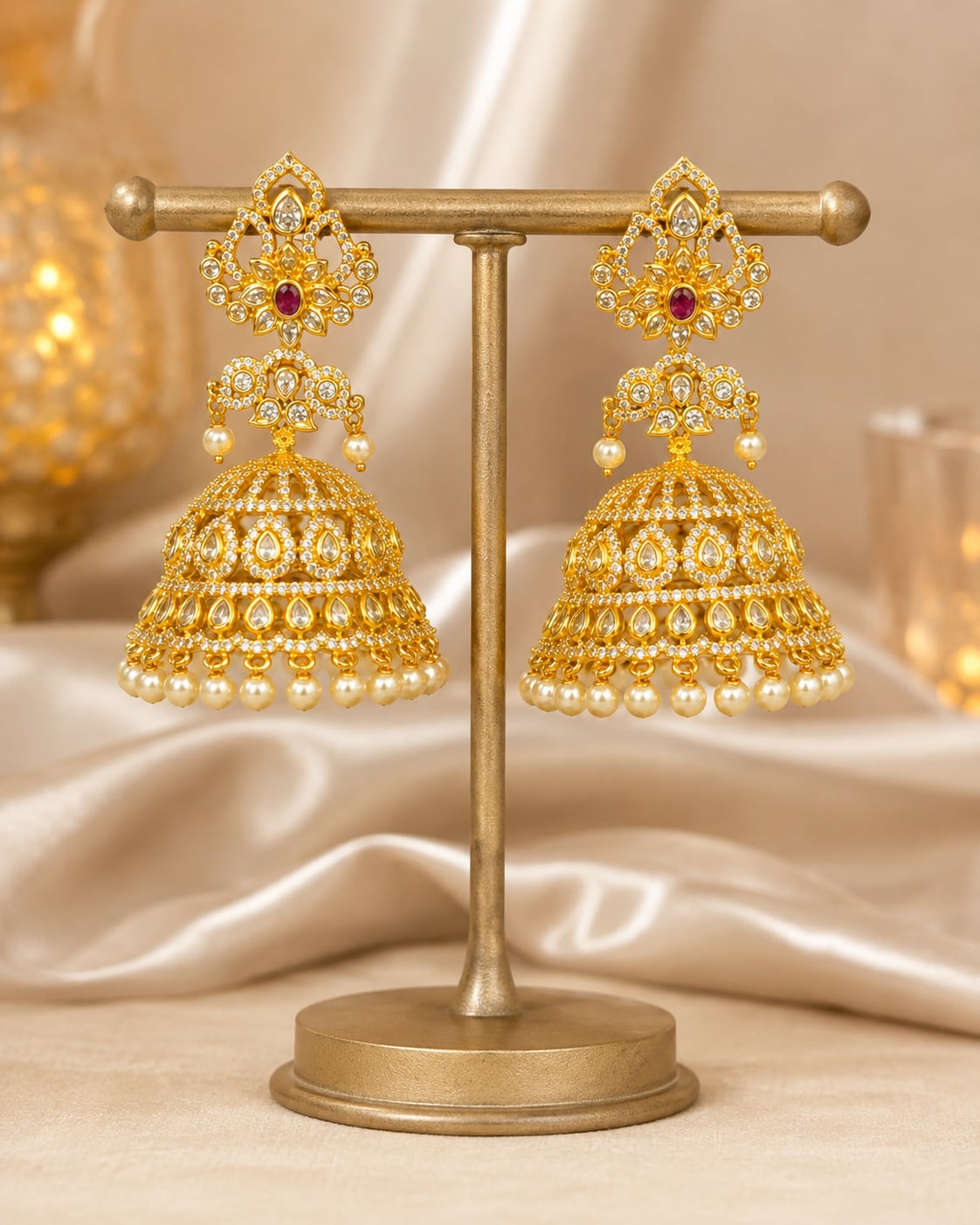 Ruby Gold-Plated CZ Grand Pearl-Look Fringe Jhumka Earrings – grand gold-plated CZ jhumka earrings with ruby – front view
