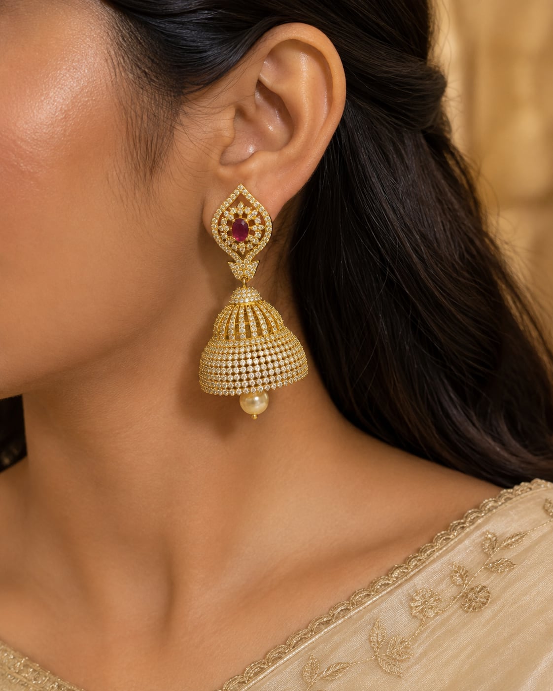 Ruby Paisley Gold-Plated CZ Bell Jhumka Earrings – Model wearing gold-plated ruby paisley CZ bell jhumka earrings – view 2