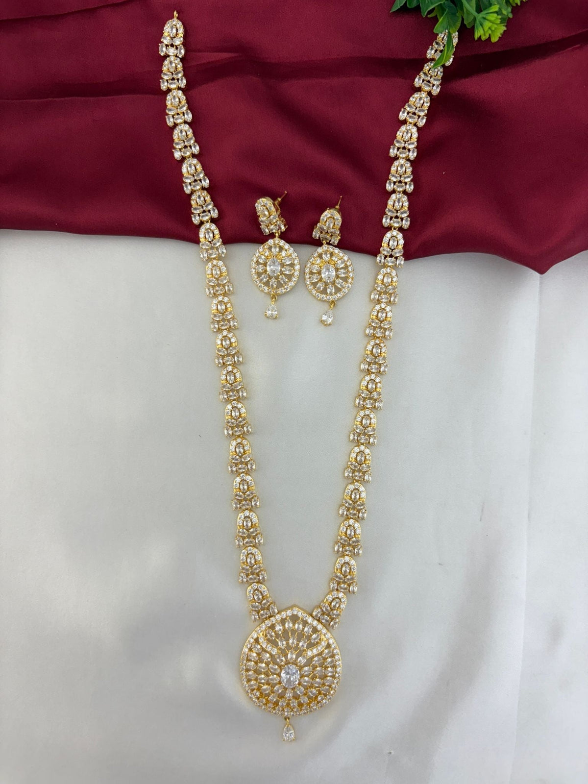 Luminous Cascade White AD Long Necklace Set showcasing the pendant design and matching earrings – front view