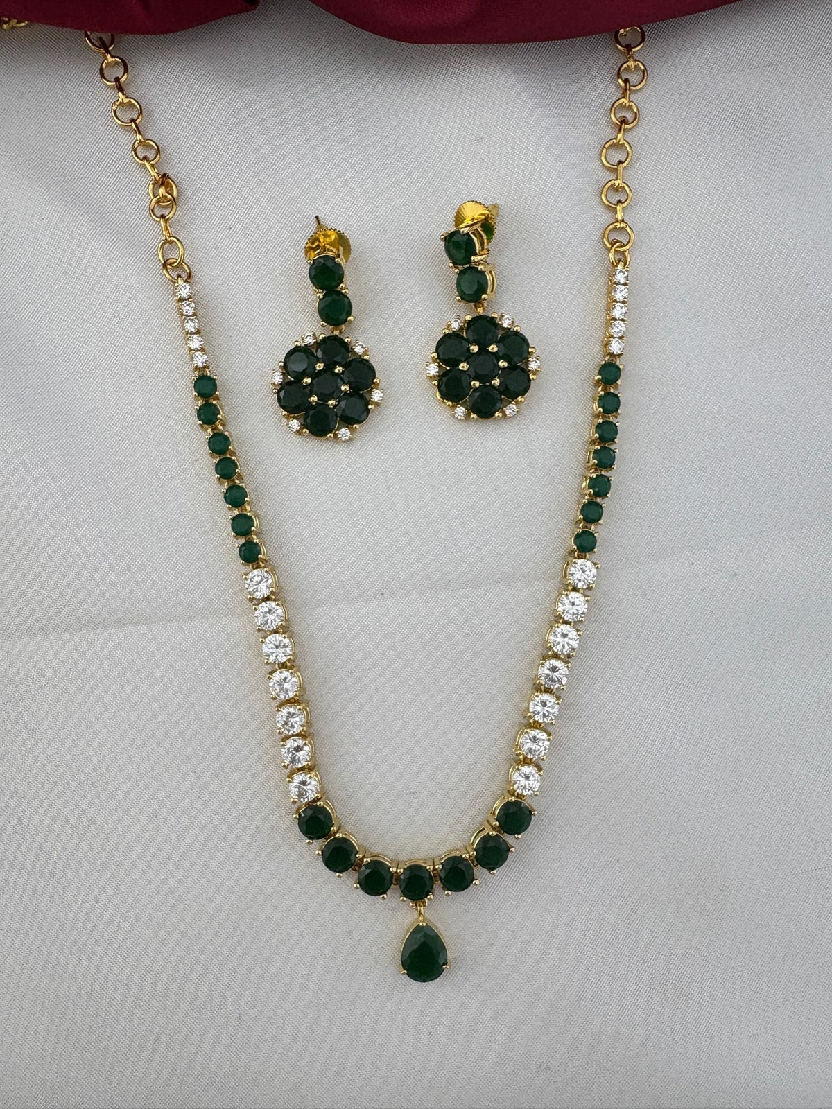 Mayur Emerald AD Short Necklace Set with matching earrings, front view