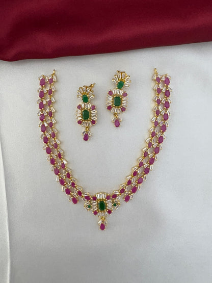 Pastel Dreams Multi-Color AD Short Necklace Set with earrings, displayed on fabric – front view