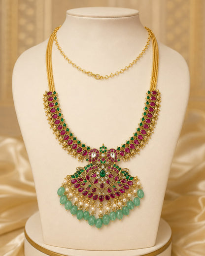 Ruby and Emerald Jadau Kundan Peacock Pendant Necklace for Wedding Functions – ruby green peacock motif jadau – front view