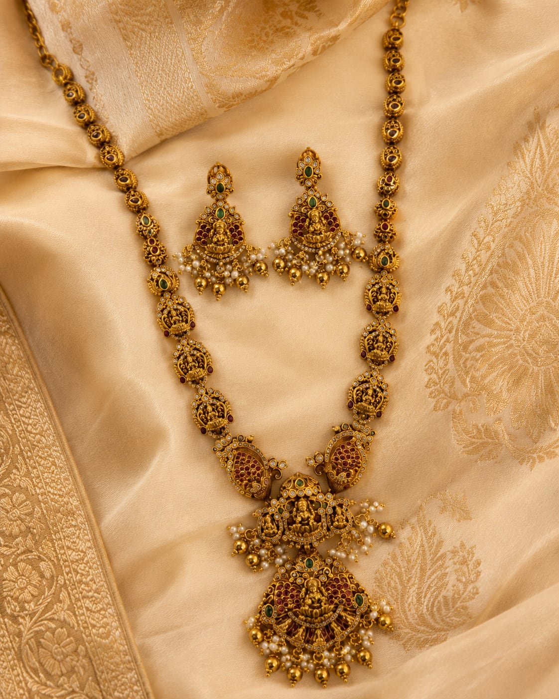 Goddess Lakshmi Ruby-Green Medallion 3D-Embossed Long Haram Necklace Set – ruby and emerald necklace set with – view 3