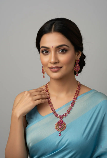 Gold Plated Ruby Floral Necklace Set - Model wearing elegant set with light blue saree – view 2
